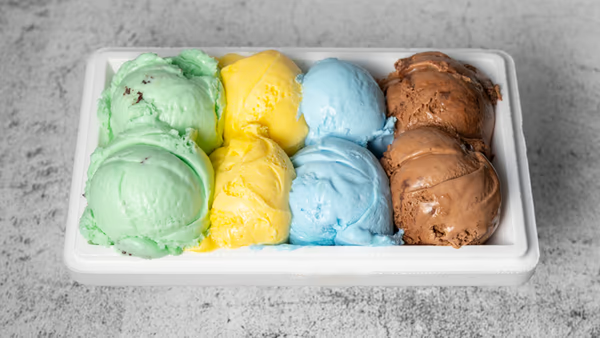 A tub of mixed ice cream flavours