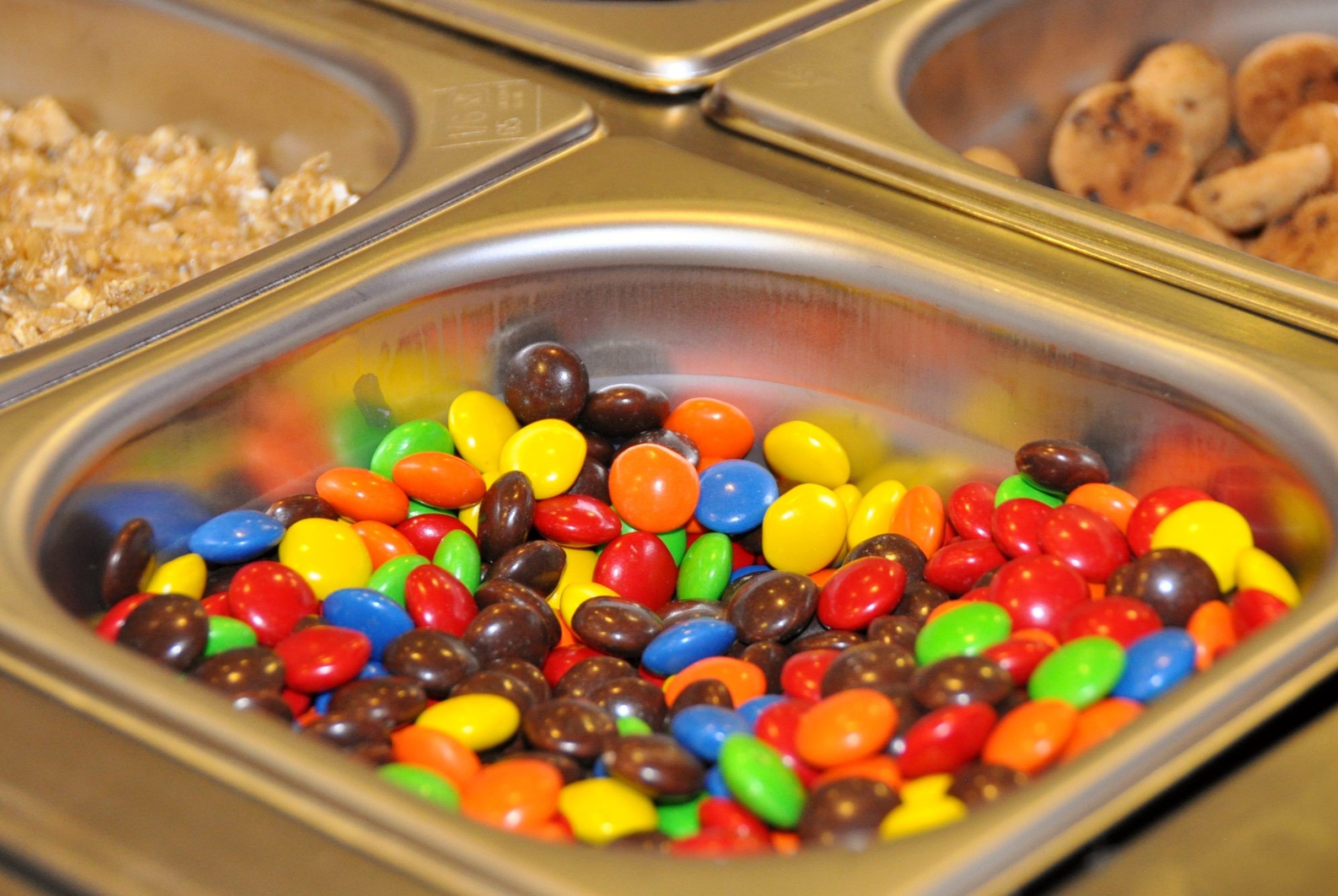 A large selection of sprinkles and toppings